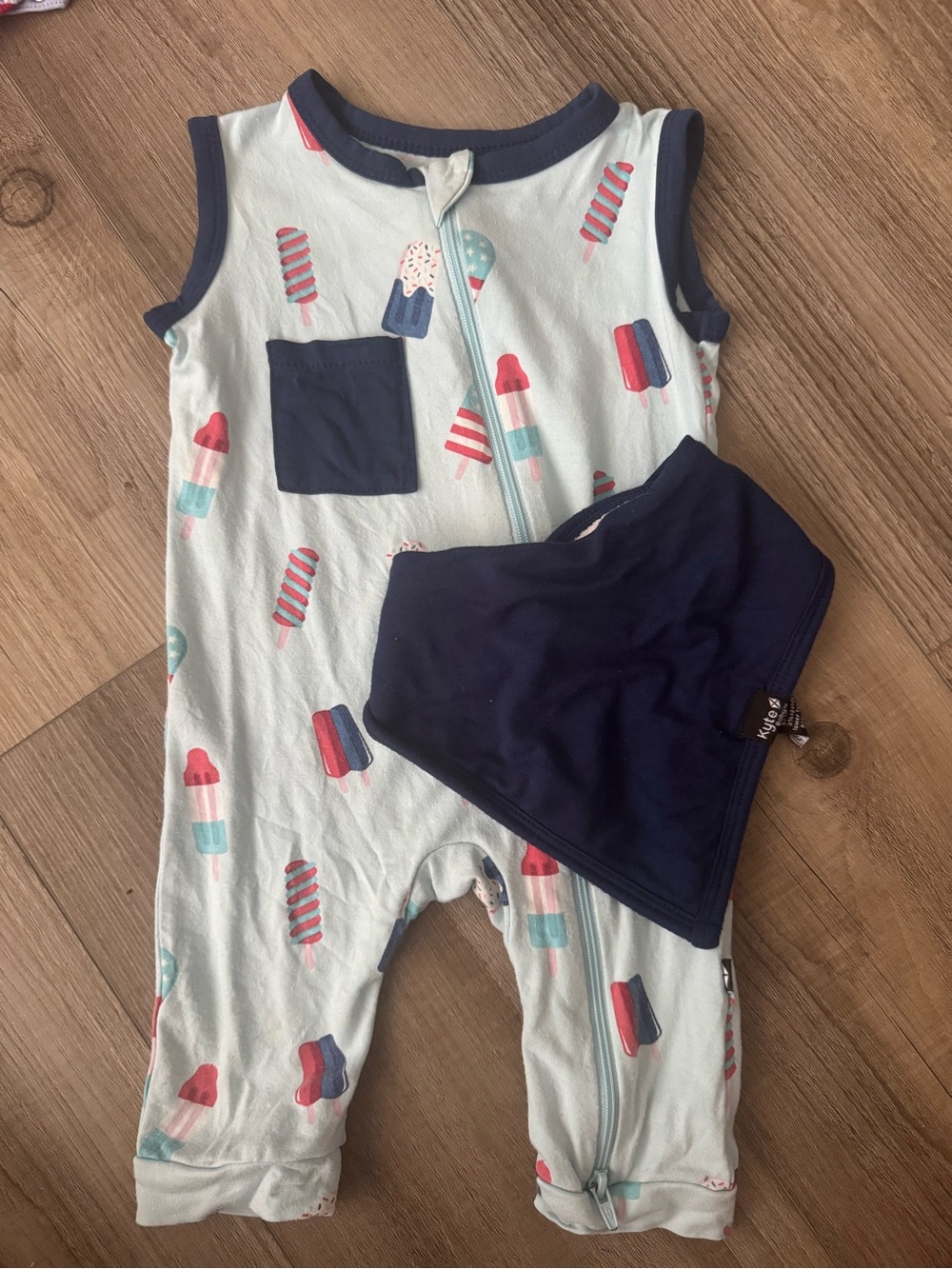 Kyte BABY Patriotic Popsicles Print Sleeveless Zip Romper with Navy Pocket & Bib